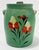 Antique farmhouse style lidded crock glazed in bright green. Features vibrant hand-painted floral motif. Marked USA on...