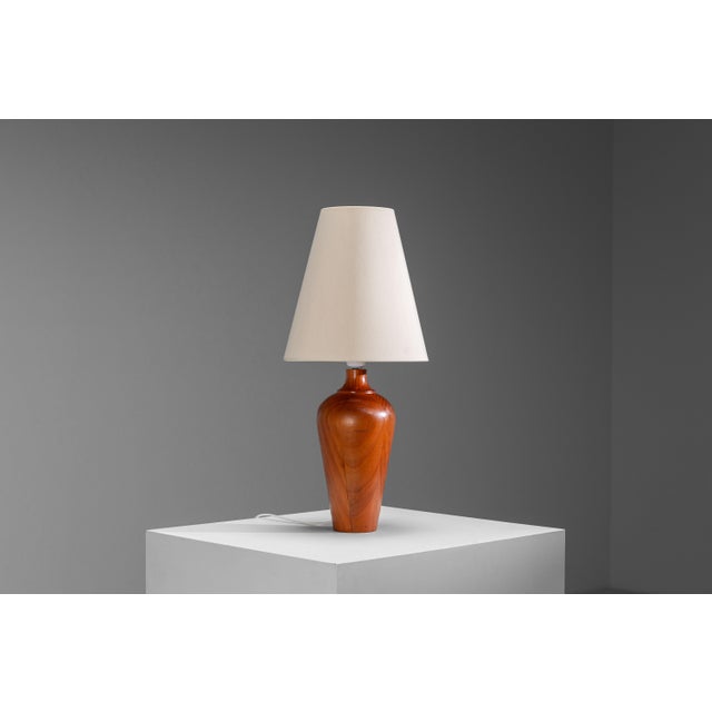 Bring warmth and timeless character to your interior with this beautifully crafted vintage table lamp, featuring a solid...