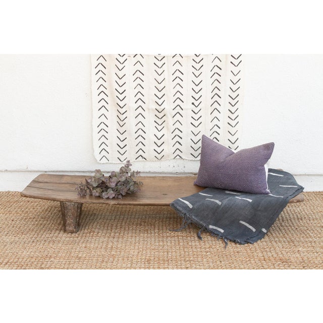 A unique addition to your home, this Senufo coffee table, crafted from a single log of wood, this antique Senufo table is...