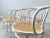 The chairs shown here are thonet 209 bentwood chairs with armrests and seats made of viennese wickerwork. This model is...