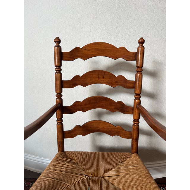 Vintage Tell City or Ethan Allen Style Colonial Early American Ladderback Dining Wooden Arm Chair featuring a hand-woven...