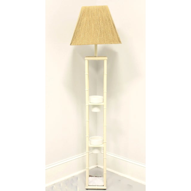 A Coastal / Tropical style floor lamp, unbranded. Metal faux bamboo shaped frame with three tiers. Two upper tiers have...