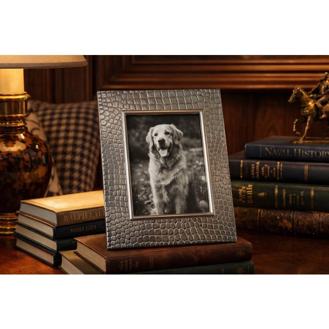 A richly textured crocodile‑embossed metal photo frame in the classic Ralph Lauren Home style — weighty, tailored, and...