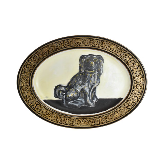 This is a portrait of Othello, an antique Staffordshire Spaniel known as a "Jackfield", in glossy black glaze over red...