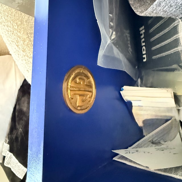 Crafted from nickel-plated metal with hand-stamped patterns applied to minimalist, modernist forms. the Talitha dresser's...