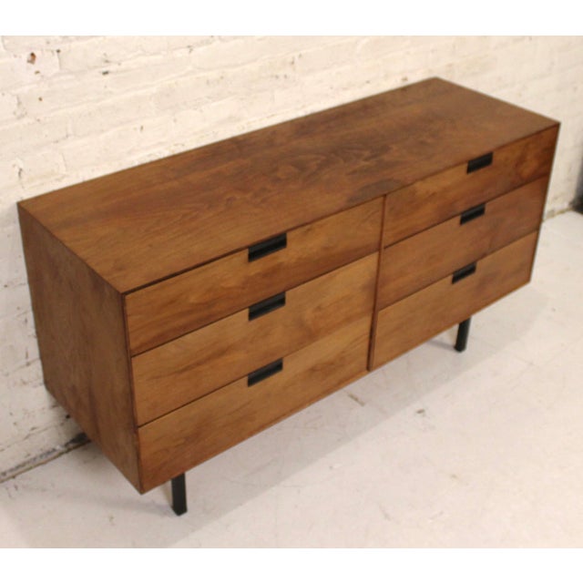 This stunning walnut dresser was designed by Milo Baughman for Directional Furniture. This unique dresser features six...