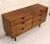 This stunning walnut dresser was designed by Milo Baughman for Directional Furniture. This unique dresser features six...