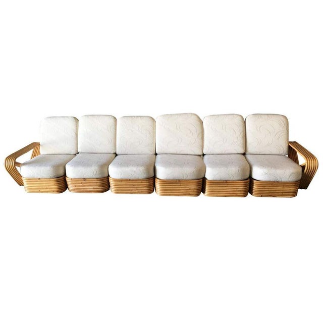 This beautifully restored coastal Art Deco six-strand square pretzel style, six-seat sectional sofa. This sofa features...
