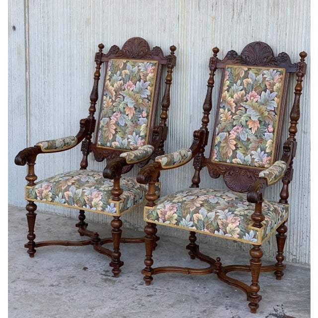 About Louis XVI style pair of carved armchairs, Spain, 1900s Good antique condition with some minor marks from used and...