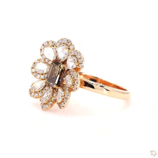 This statement ring from our contemporary estate collection centers on a 0.71-carat diamond in a rose cut, prized for its...