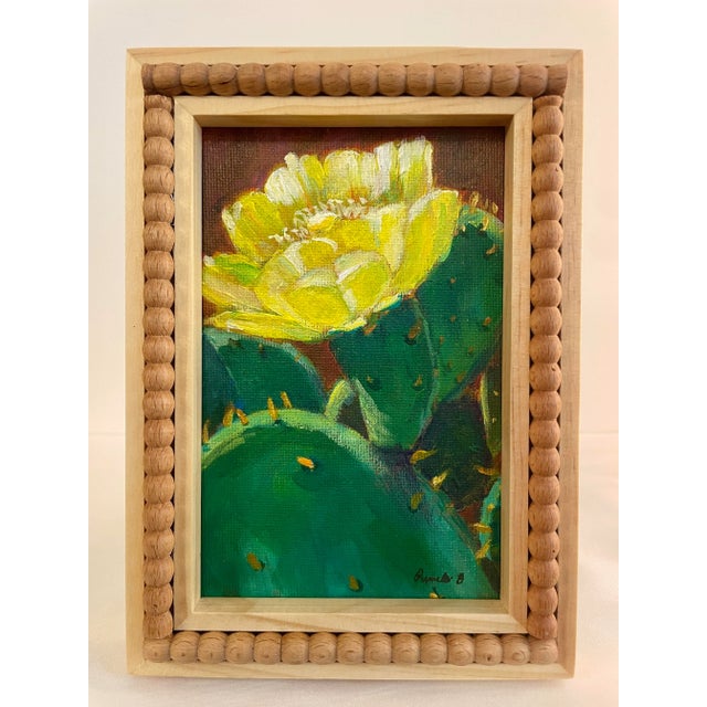 Bring a touch of the Southwest desert into your home with this original cactus flower painting. This piece captures a...