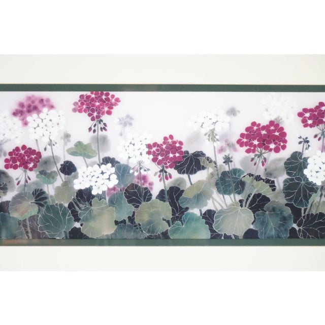 Striking large floral panel print featuring a horizontal garden vignette of rounded blossoms in deep magenta and white...