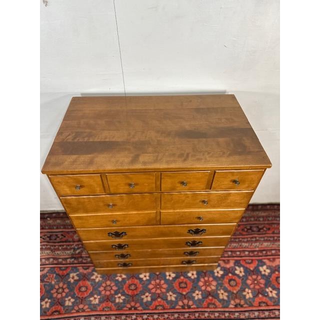 This Ethan Allen 4-Drawer Tallboy Dresser is a quietly confident storage piece—solid, practical, and designed to age...