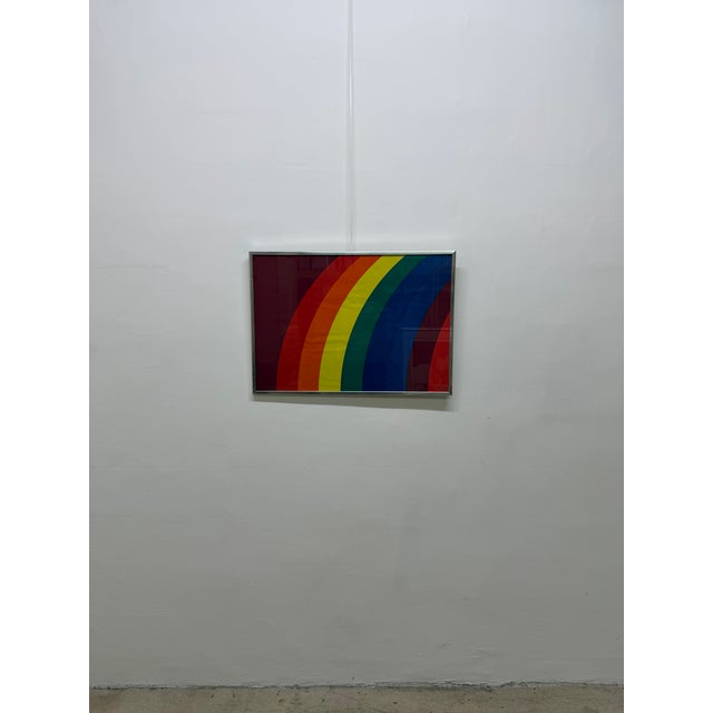 This 1970s multiple, titled "Rainbow Banner," is an authentic color screenprint executed directly onto a heavy, woven...