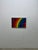 This 1970s multiple, titled "Rainbow Banner," is an authentic color screenprint executed directly onto a heavy, woven...
