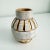 1950s Italian glamour in this rare ceramic bud vase with design attributed to Aldo Londi for Bitossi. Incised design and...