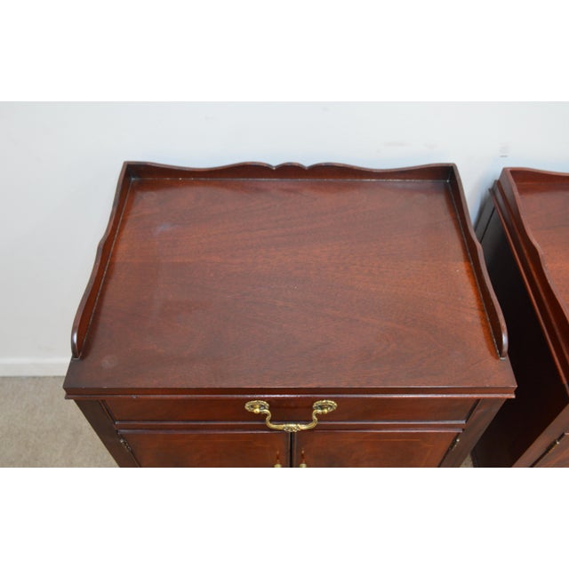 Pair of Nightstands by Baker. Store item #564. They feature one drawer and storage compartment.