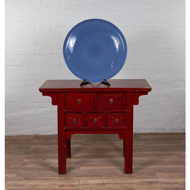 A Chinese vintage blue ceramic charger plate from the second half of the 20th century. We have two charger plates...