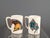 Rare set by Bucciarelli, Milan, in excellent condition. Two handled mugs with motifs of historical flags, clothing, and...