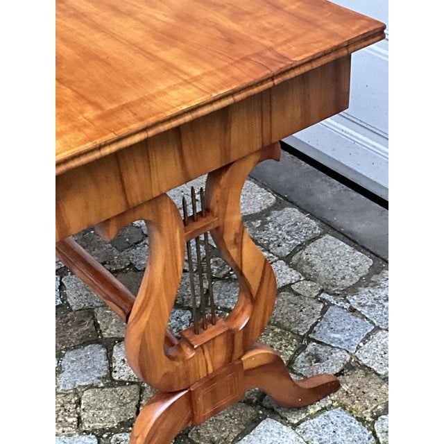 I am offering an original desk, so-called Bureau Plat, veneered in cherry wood, with a beautiful cherry wood grain. It...