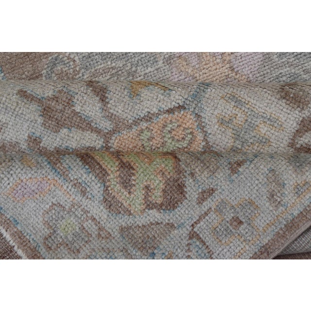 Long Turkish Oushak Runner With Pale Blue, Soft Yellow, and Light Brown Motifs For Sale - Image 12 of 13