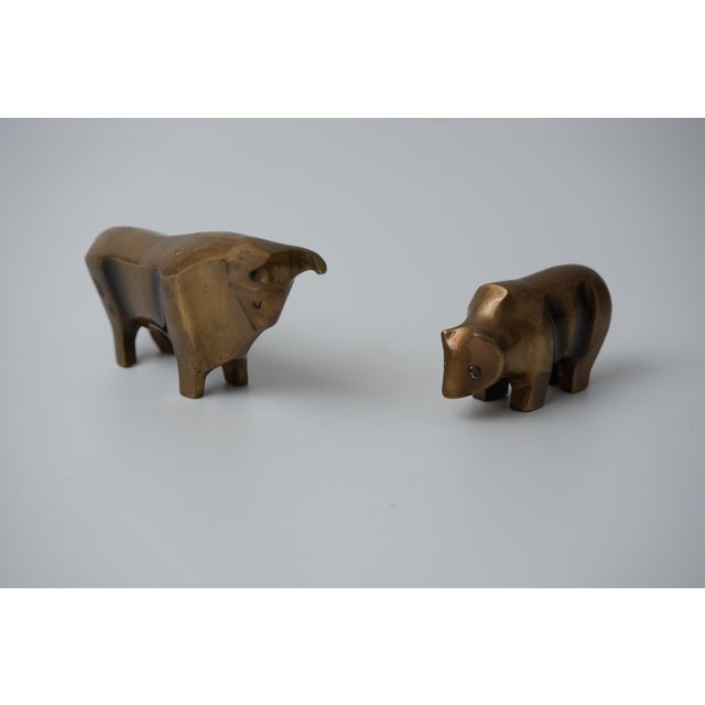 Bull and Bear Dimensions: 12.8 x 3.8 x 6.6 cm and 7.2 x 3 x 4.8 cm Some objects don't just represent an idea – they embody...