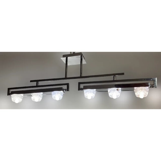 Bohemian glass and chrome-plated metal lamp. It has a bohemian guarantee mark. Manufactured in the 90s and has two rails...