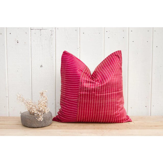 A beautiful Mashru silk lumbar pillow with a lovely embroidered tribal border of geometric and floral motifs. Mashru is...