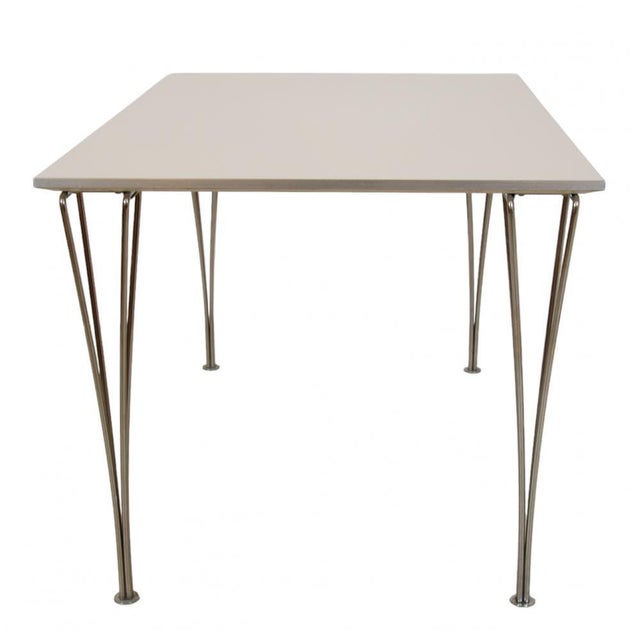Piet Hein white square table 120x80 Cm. The tables are from between the year 1989 and 2000 and originate from the same...
