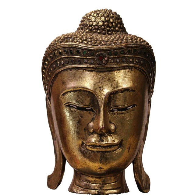 Master handcrafted Buddha head on stand, this statue is carved with solid wood painted with gold color, decorate with...