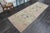 Vintage Hand-Knotted runner rug is a semi-antique vintage runner rug. The '70s Eastern region of Anatolia's unique rug is...