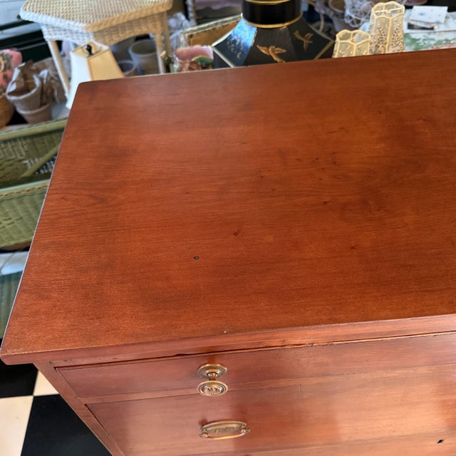 This gorgeous antique Hepplewhite tallboy dates from between 1780-1810, and is made of solid cherry. Original brass...