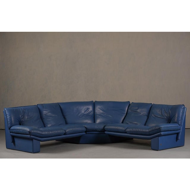 A Nicoletti Salotti post-modern leather sofa and armchair set from Italy, 1980's. Produced by Avanti and designed by...