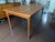 This exceptional single-owner Danish Modern draw-leaf dining table was manufactured by Brdr. Furbo in Spøttrup, Denmark....