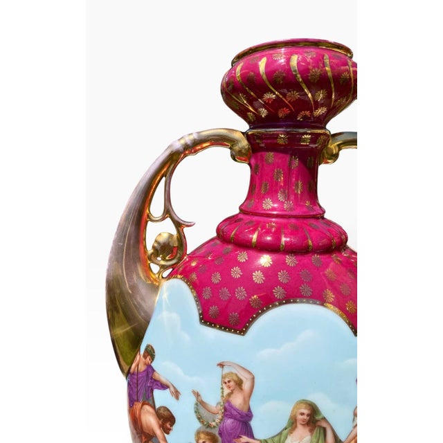 Antique Royal Vienna Style Porcelain Twin-Handled Urn Vase. Crafted in the neoclassical style popularized by the Imperial...
