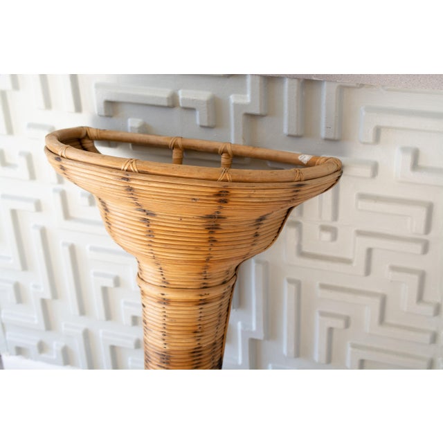 This listing is for an oversized, wall pocket planter/vase circa 1980s. It is made of pencil reed burnt bamboo. Very cool...