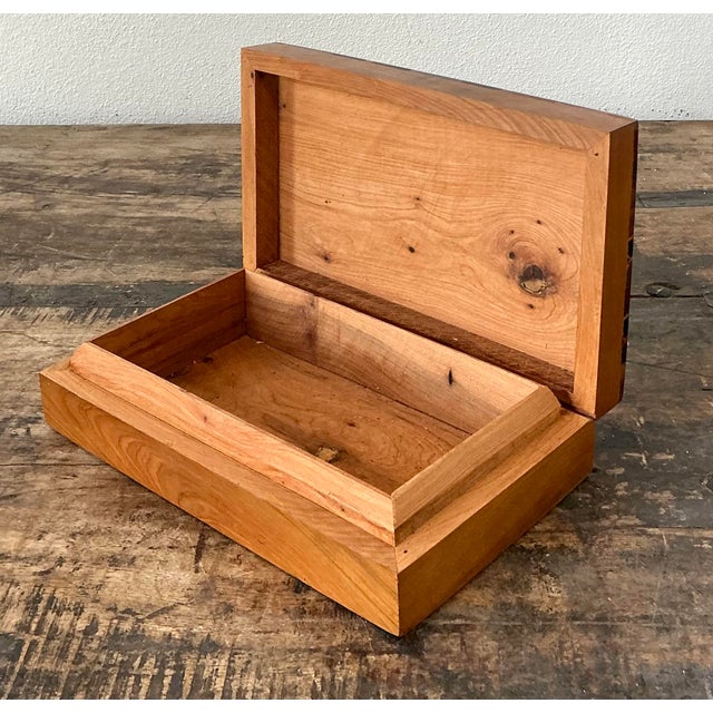 This striking vintage box features a bold Harlequin pattern, meticulously crafted through a masterful wood inlay...