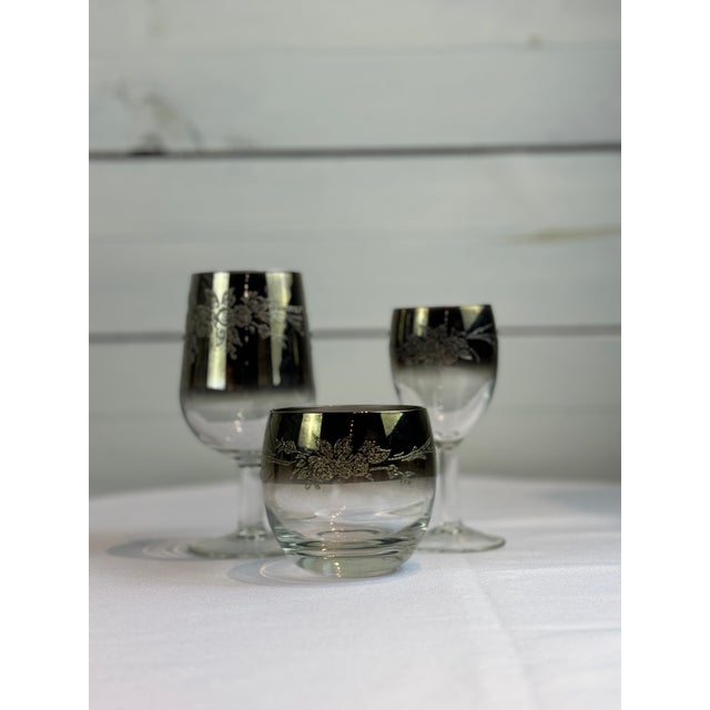 Elevate your entertaining with this exquisite 1970s Mid Century/Retro Vintage Floral Etched Queen Lusterware Cocktail Set....