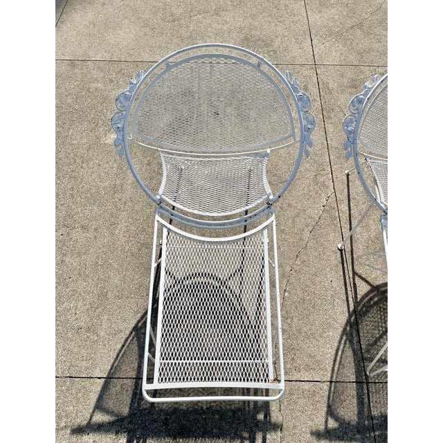 Striking pair of Mid Century patio lounge chairs. Footrests attach and detach easily. I’ve never before seen any of these...