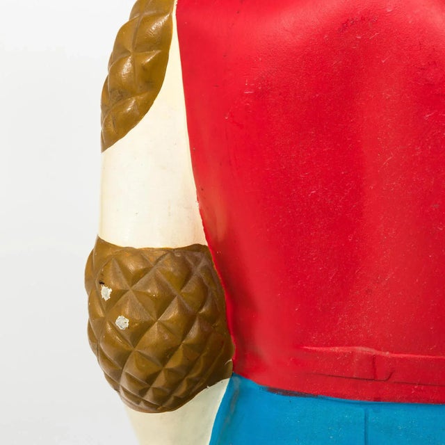 Painted advertisement football figure made of Resin for Kessler Bourbon that stands 45.00 inches tall.