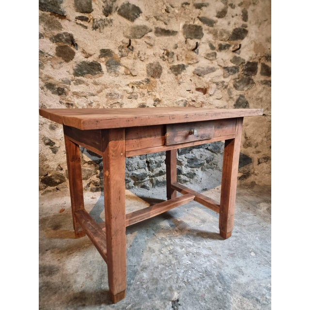 This antique French work table or writing desk dates from the late 19th century (circa 1850–1900) and is made of solid...