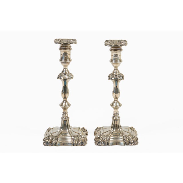 Pair of Sheffield silver plate weighted candlesticks in the George II and Rococo revival style, the baluster and knopped...