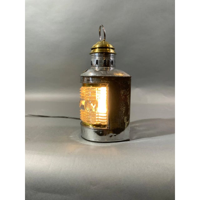 Nice masthead lantern by Triplex. Polished steel case with vented brass top. Lantern has the rare rippled Fresnel glass...