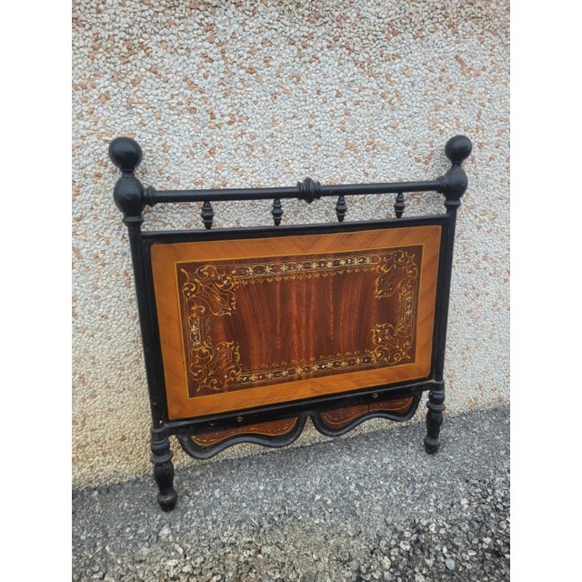 Antique wrought iron headboard, hand-decorated. Good overall condition, with minor signs of wear. Excellent as a...