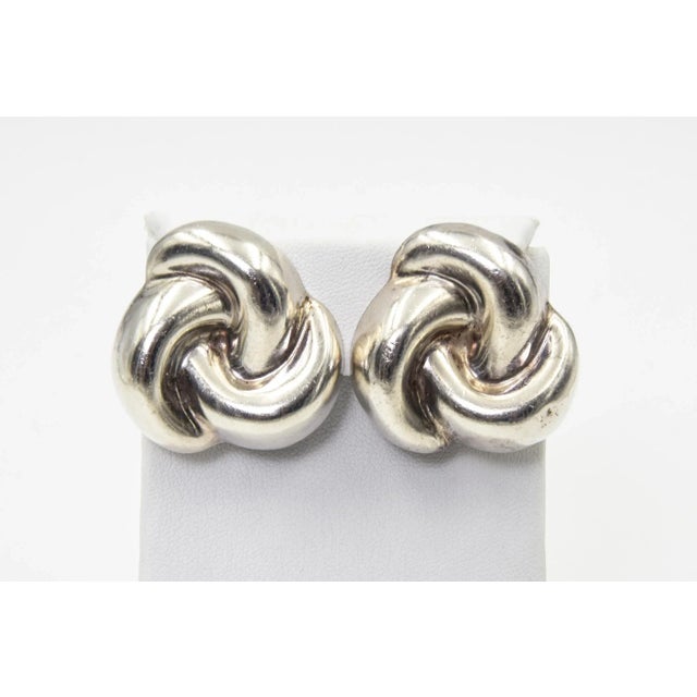 Pair of vintage Mexico Mexican knot design clip on earrings marked 925 Mexico Nestor TJ24.
