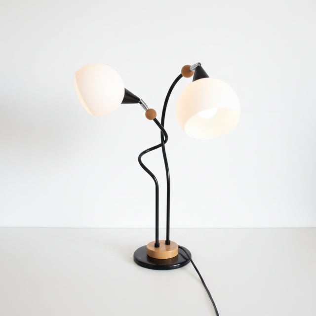 This elegant Mid-Century Modern table lamp, often referred to as the “Bony Design,” beautifully combines organic warmth...