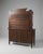 A beautifully crafted antique oak sideboard featuring a classic mirror-back design with turned columns and a shaped crown....