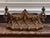 A substantial cast bronze planter in the Gothic Revival taste, the body cast with pointed arch arcading filled with...