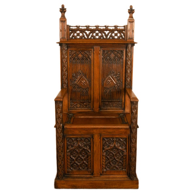 Antique French carved oak Gothic Revival high-back storage chest throne chair, circa 1880 This very attractive Gothic...