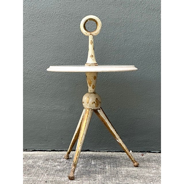 This exquisite 1940s Italian side table is a masterful expression of Neoclassical elegance, perfectly suited for a...